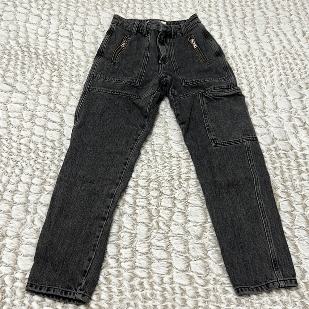 I am selling a brand new pair of Topshop black jeans.